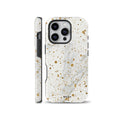Elegant white marble phone case covered in sparkling gold dots and glitter splatters, available for iPhone, Samsung Galaxy, and Google Pixel models.