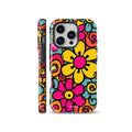 Vibrant 70s groovy retro floral phone case featuring bright yellow and pink flowers with colorful swirls, available for iPhone, Samsung Galaxy, and Google Pixel models.