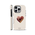Minimalist beige phone case featuring an artistic burgundy and gold brush stroke heart illustration, available for iPhone, Samsung Galaxy, and Google Pixel models.