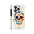Cream colored phone case featuring a detailed colorful Mexican Sugar Skull design with floral ornaments, compatible with iPhone, Samsung Galaxy, and Google Pixel devices.