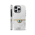 White marble phone case featuring a gold evil eye protection symbol with a bright blue eye and a thin gold accent line across the center. Fits iPhone, Samsung, and Pixel devices.