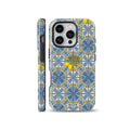 An elegant phone case featuring a blue and yellow Mediterranean tile pattern with fresh lemons and leaves, designed for iPhone, Samsung, and Pixel.